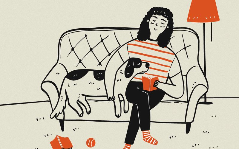 Illustration of a person sitting on a couch.